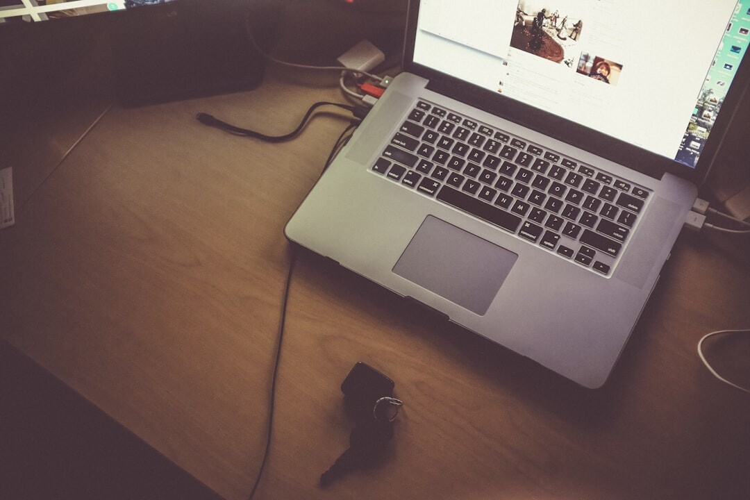 blogger typing on laptop