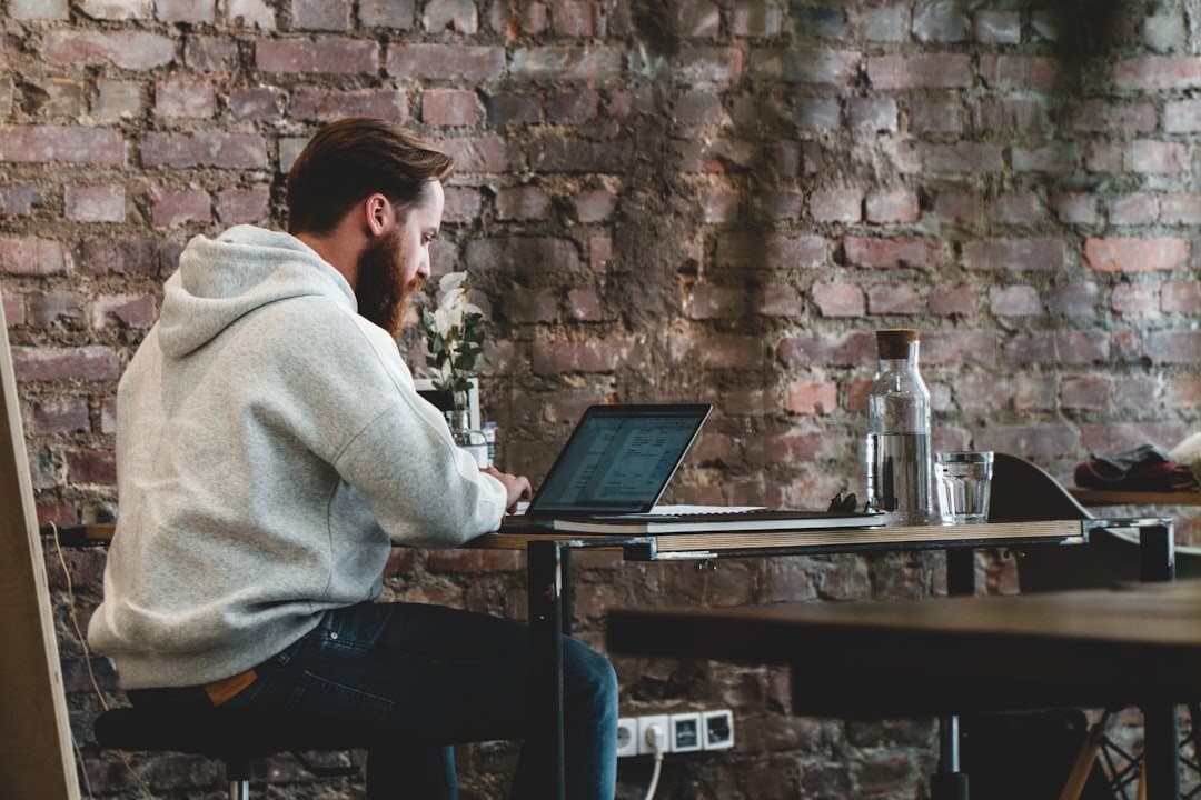 programmer working on laptop