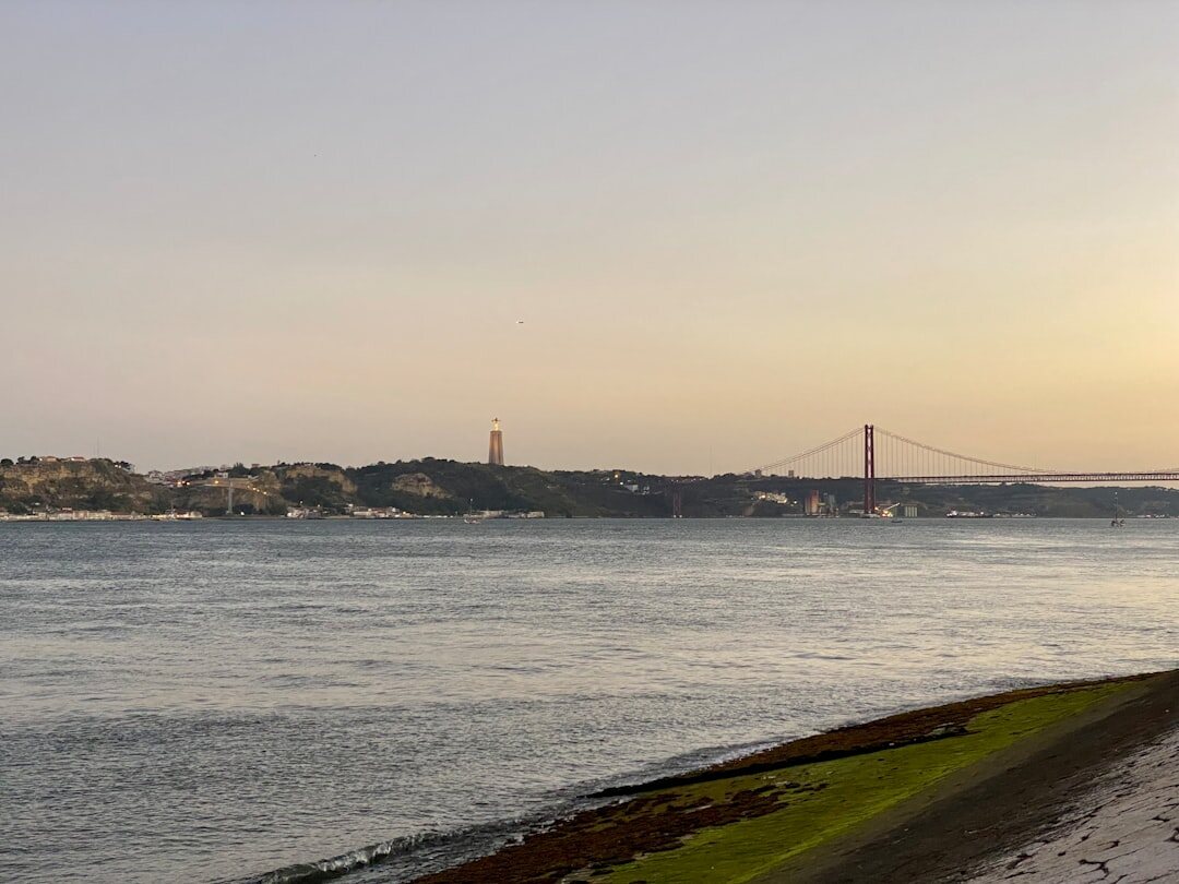 Lisbon skyline at dusk with the Tagus river