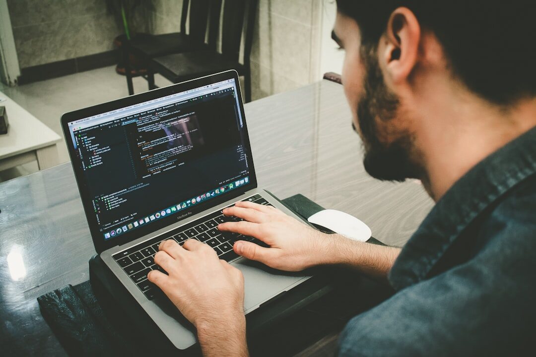 coding on laptop screen